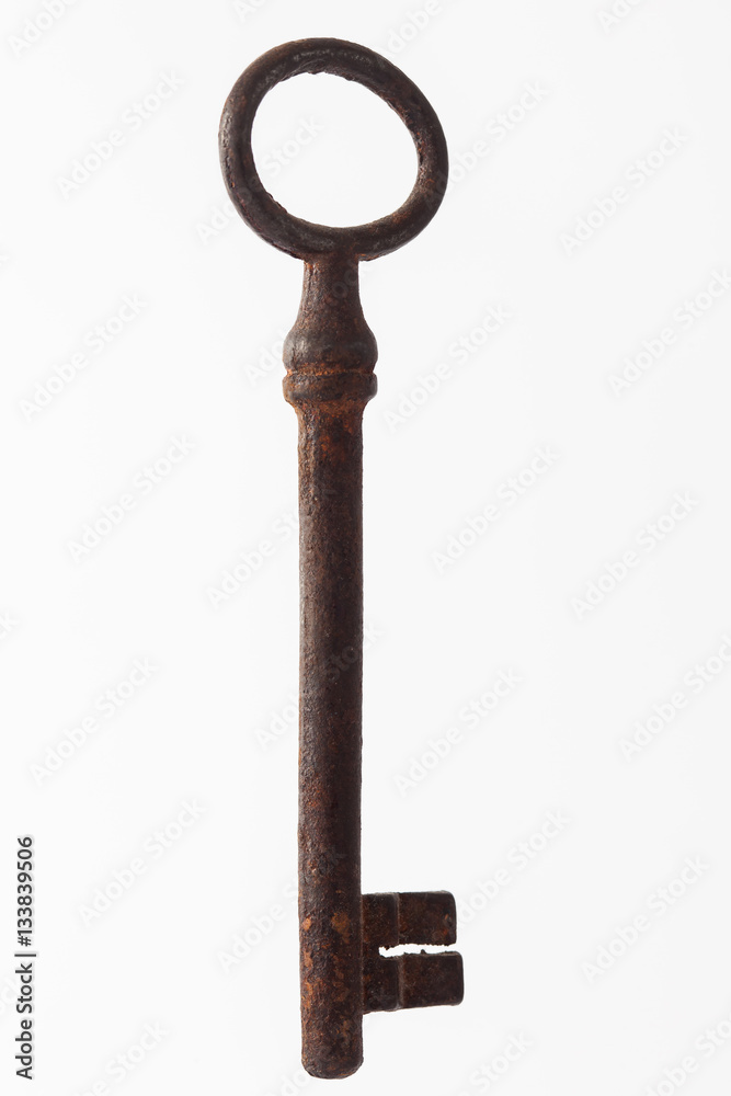 Antique rusty key isolated on white background Antique rusty key isolated on white background