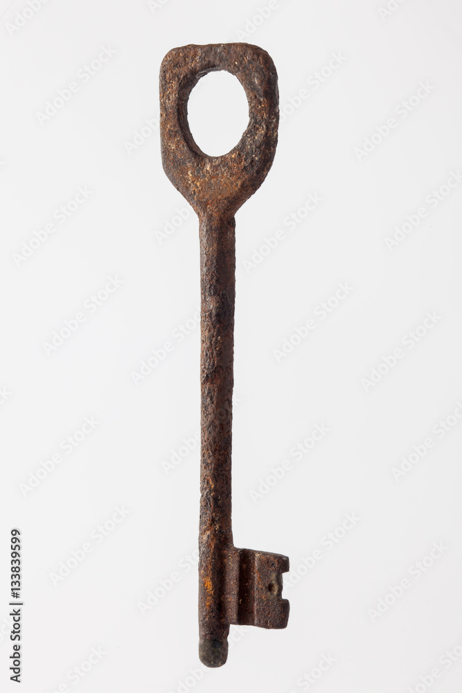 Antique rusty key isolated on white background Antique rusty key isolated on white background