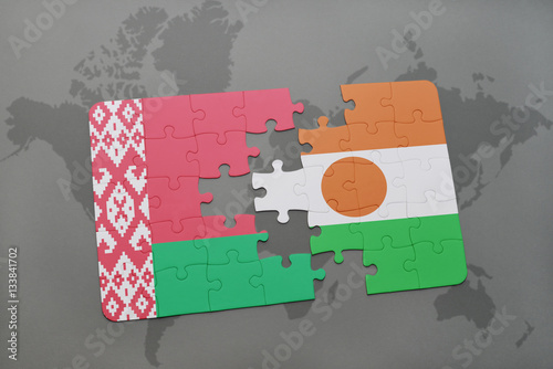 puzzle with the national flag of belarus and niger on a world map