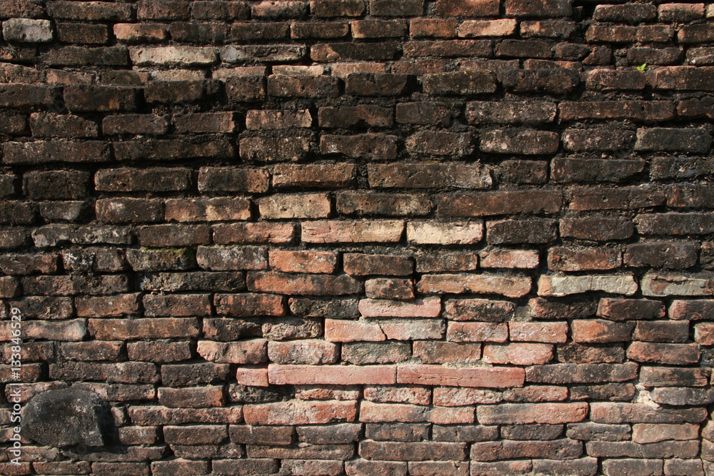 Obraz premium Old weathered brick wall background texture.
