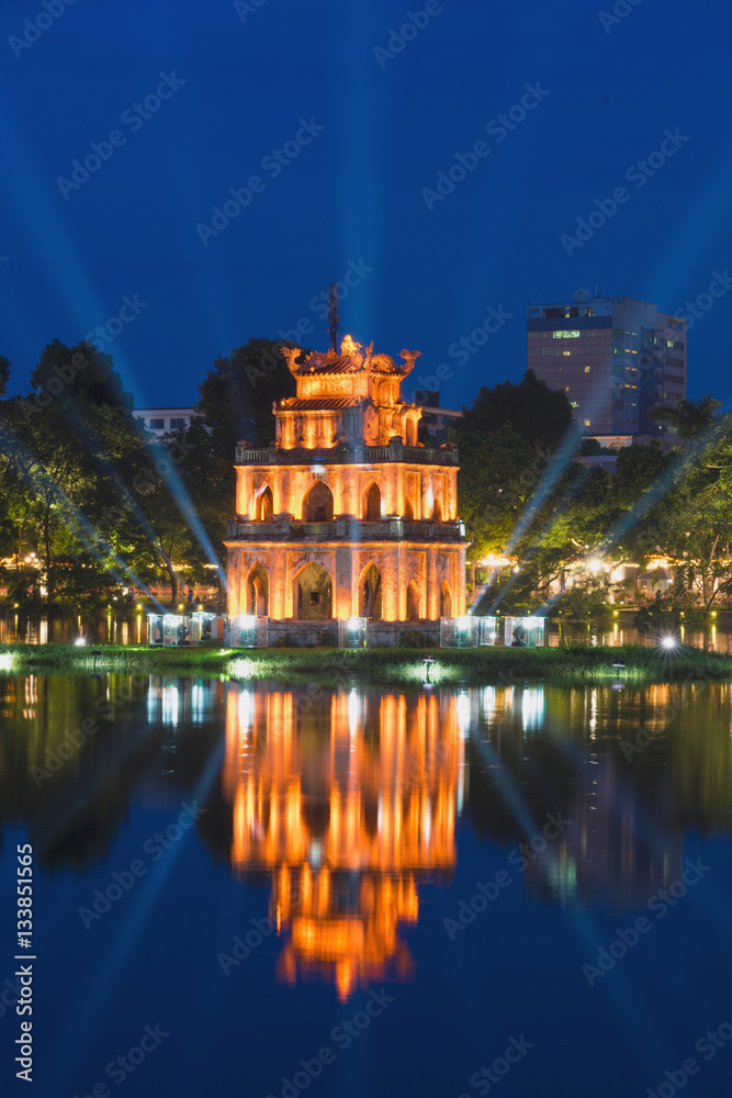 Turtle Tower, the symbol of Vietnam, at twilight period at Hoan Kiem lake (Ho Guom or Sword lake)