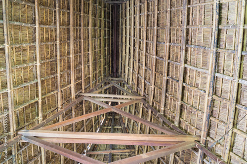 Inside architecture of typical house of J'rai people in central high land of Vietnam photo