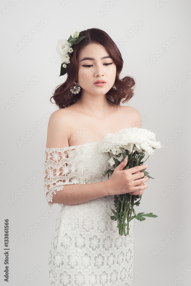 Beautiful asian woman bride on grey background Beautiful asian woman bride on grey background