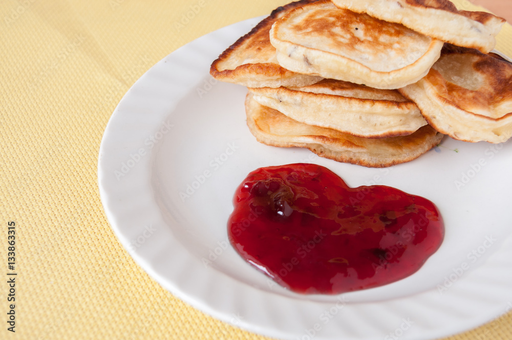 Delicious pancakes for breakfast with cherry jam Delicious pancakes for breakfast with cherry jam