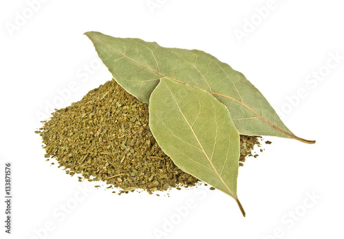 Bay leaves and crushed bay leaves isolated on white background