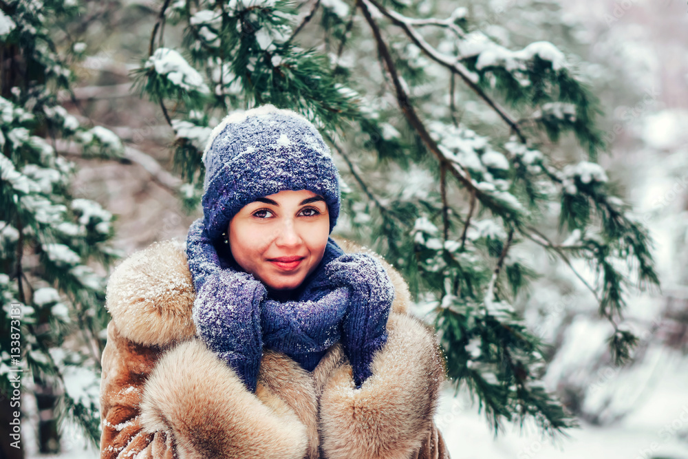 young pretty girl walking outdoor in winter time young pretty girl walking outdoor in winter time