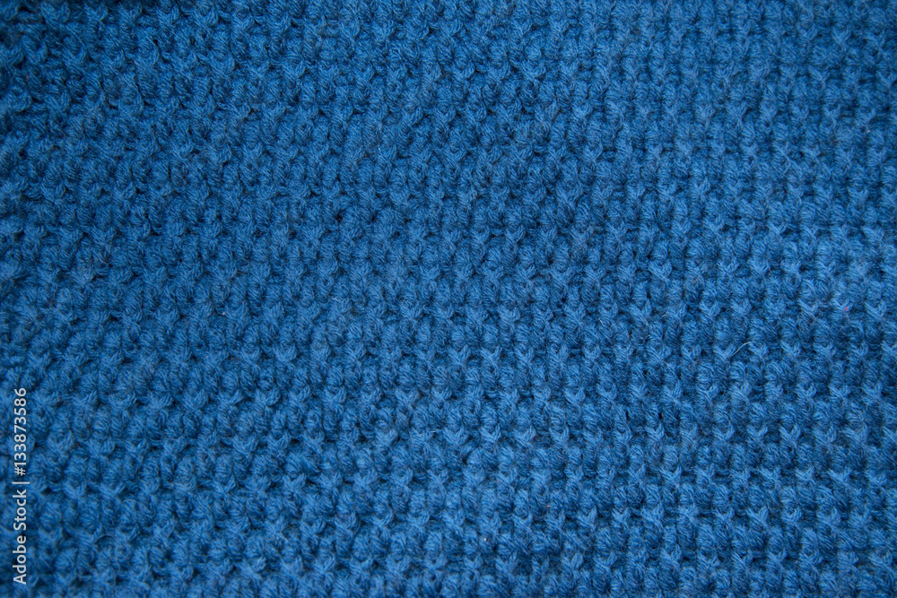Blue top knitted in manual photographed in close-up. Blue top knitted in manual photographed in close-up.