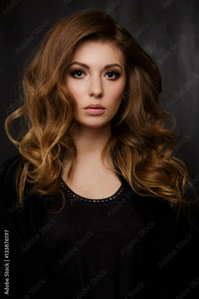 Fototapeta premium Beautiful girl in black dress