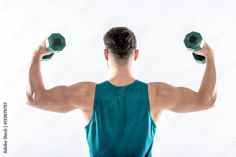Man exercising with dumbbells Man exercising with dumbbells