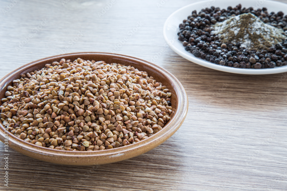 Buckwheat on the wooden board. Healthy eating and lifestyle. Buckwheat on the wooden board. Healthy eating and lifestyle.