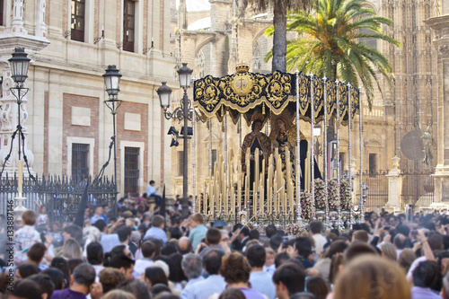 People tacking a virgin on Holy week in Seville, Andalusia, Spain. photo