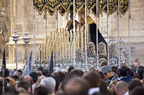 People tacking a virgin on Holy week in Seville, Andalusia, Spain.