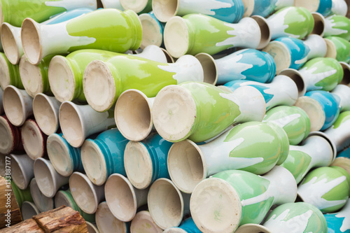 Pottery bottles in Bat Trang ancient ceramic village. Bat Trang village is the oldest and best known pottery village of Vietnam photo