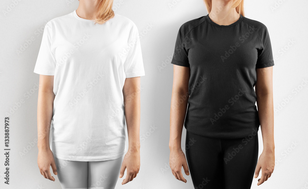 Blank black and white t-shirt design mockup, isolated. Women wear tshirt  template, front view mock up. Empty apparel uniform singlet, female model.  Plain sweat tee shirt dress set. foto de Stock