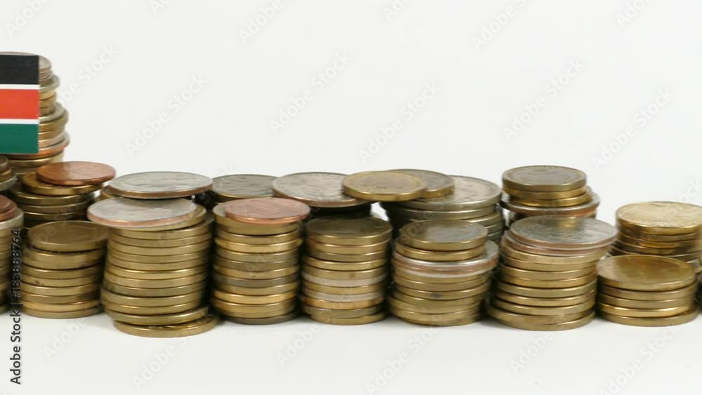 Kenya flag waving with stack of money coins Kenya flag waving with stack of money coins