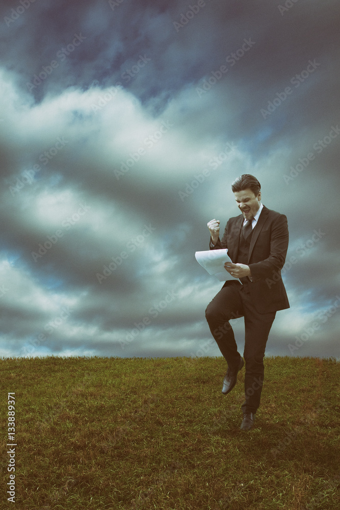 Happy Businessman is Reading Documents Happy Businessman is Reading Documents