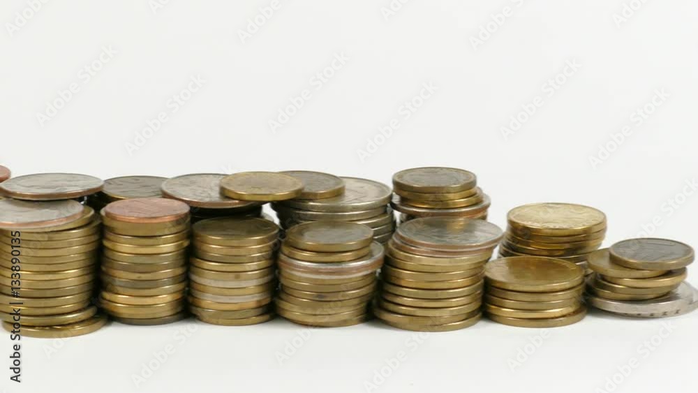 Finland flag waving with stack of money coins Finland flag waving with stack of money coins