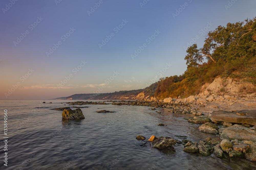 tranquility and calm day view of  rocky coast  .