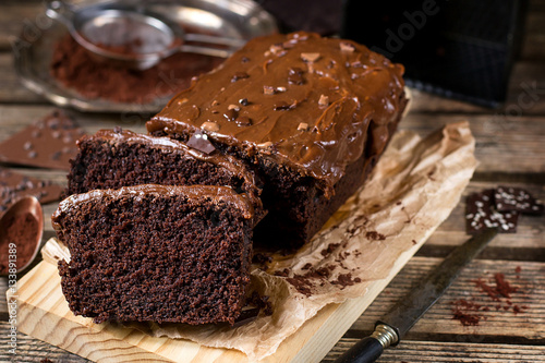 Moist chocolate cake with milk chocolate topping glaze