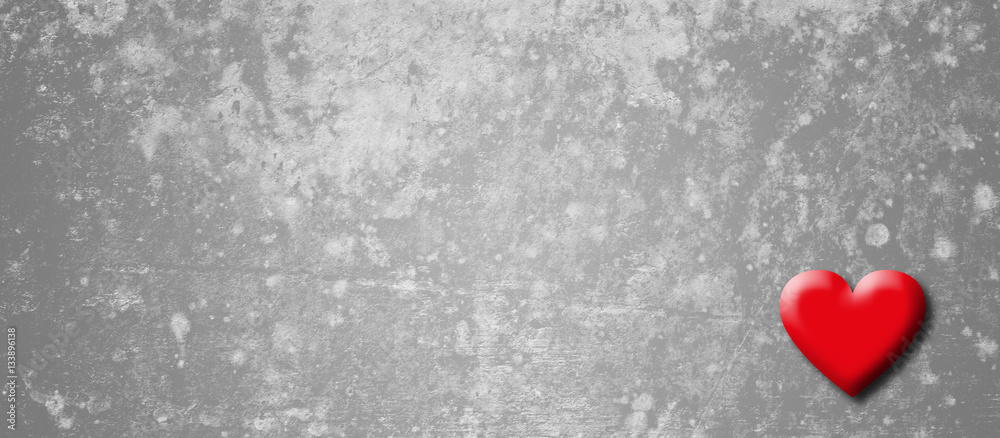 grey background with a red heart and copy space grey background with a red heart and copy space