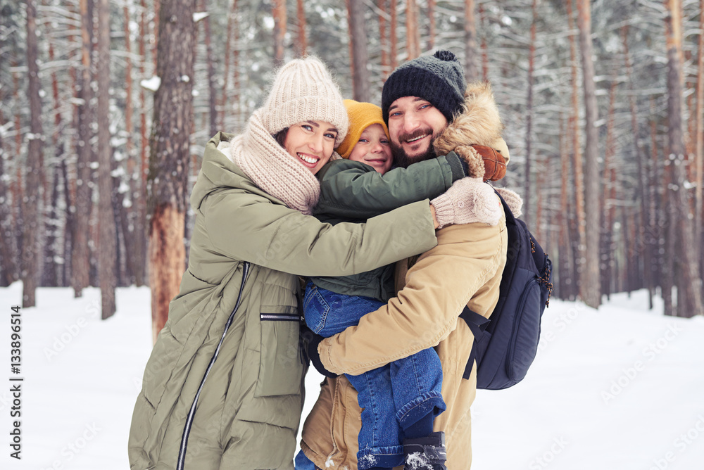 Fototapeta premium Delightful family hugging each other showing the truly love whil