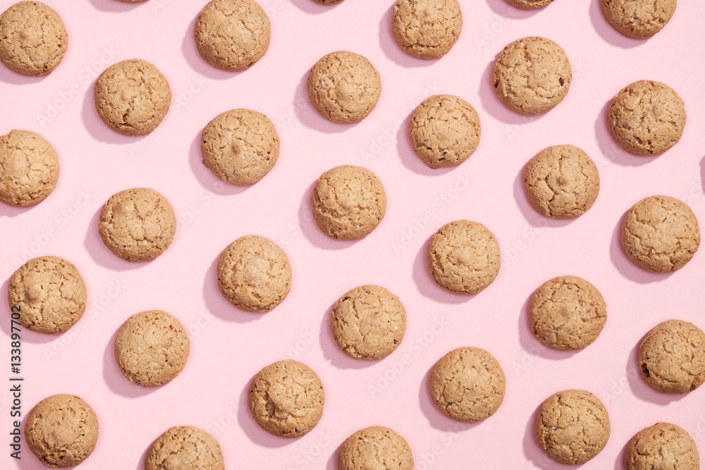 Pattern of sweet cookies on pink background Pattern of sweet cookies on pink background