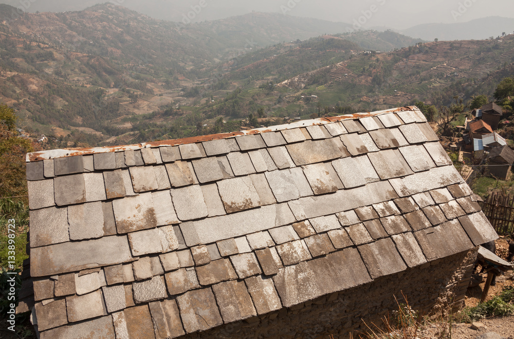 Texture of the stone roof of the house. Structural features of houses in rural areas of Nepal.