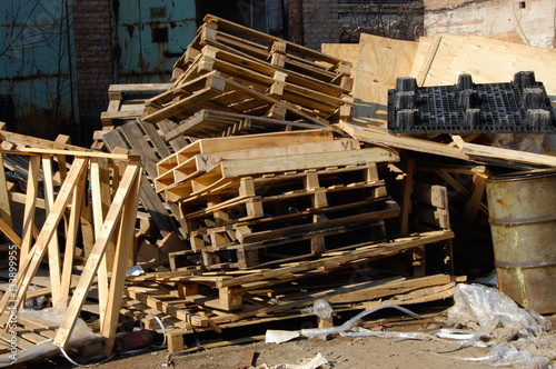 Pallets are used and discarded in the trash.
