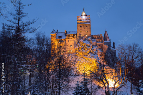 Winter view of Bran castle  also known as Dracula s castle  at blue hour