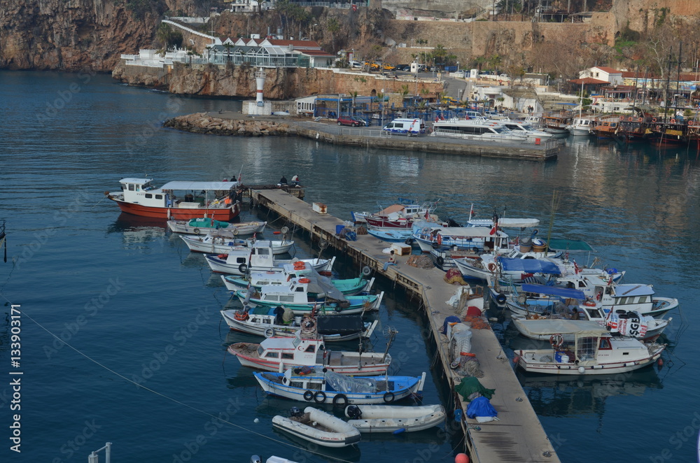 many fishing boats parking near pier antalya turkey
