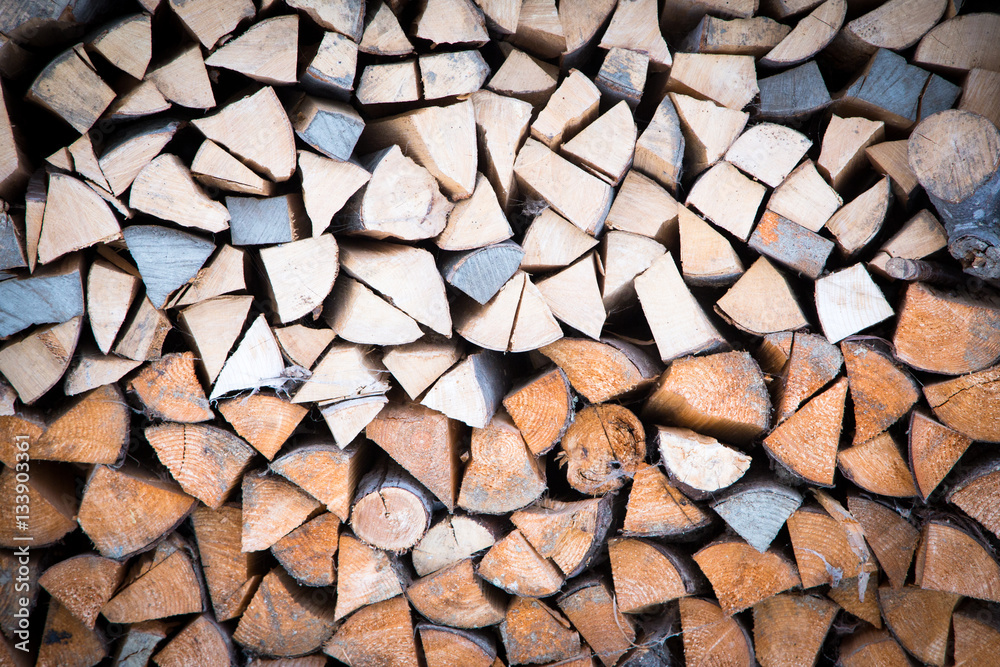 background of firewood stack background of firewood stack