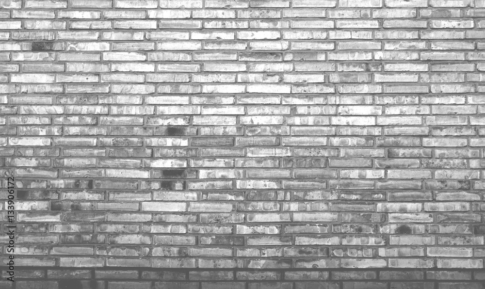 Grau alte Backsteinmauer als Hintergrund