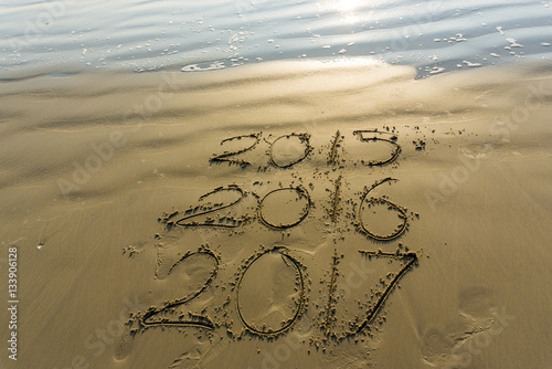 Numbers 2017 on beach wave, Newyear concept