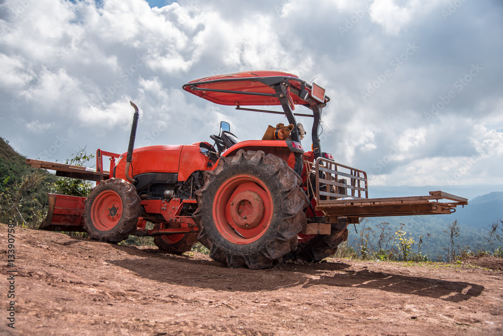Farmer with tractor seeding crops Farmer with tractor seeding crops