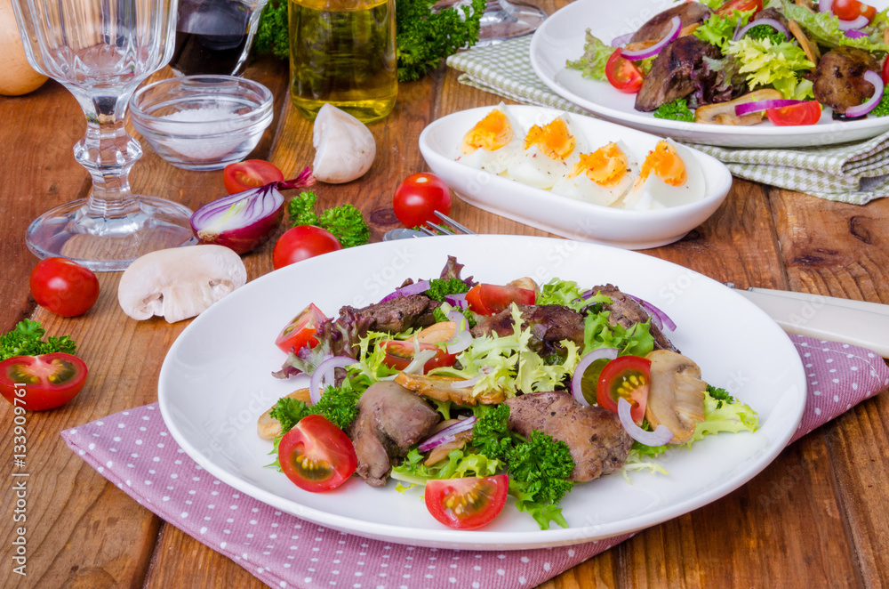 Salad with chicken liver, fried mushrooms and tomatoes Salad with chicken liver, fried mushrooms and tomatoes