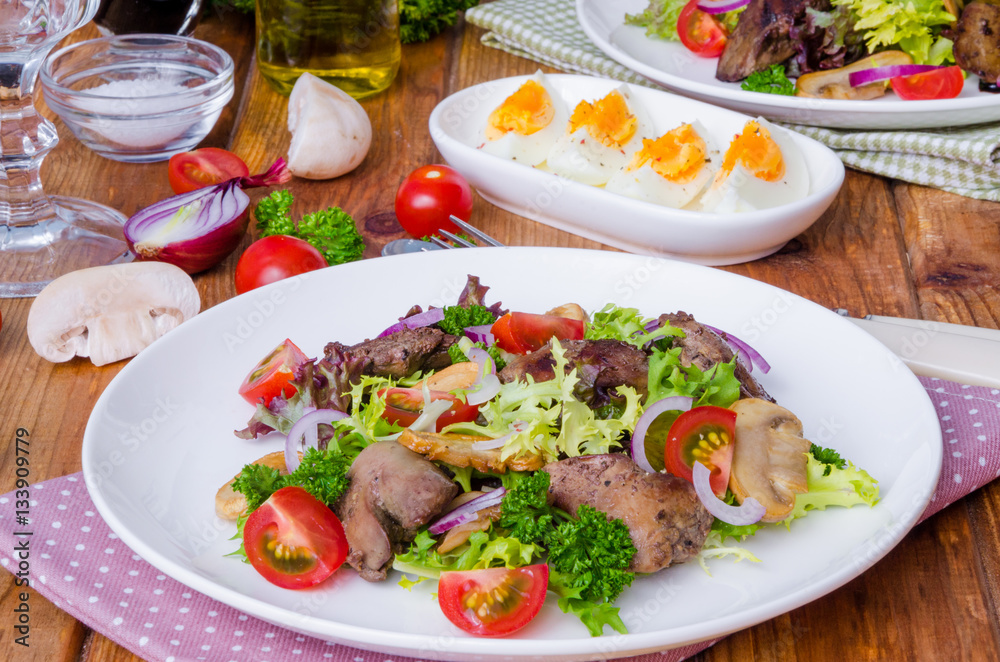 Salad with chicken liver, fried mushrooms and tomatoes Salad with chicken liver, fried mushrooms and tomatoes