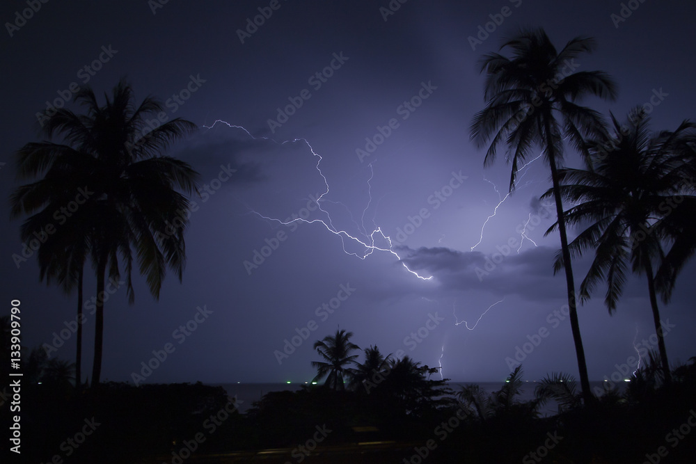 Lightning over tropical beach