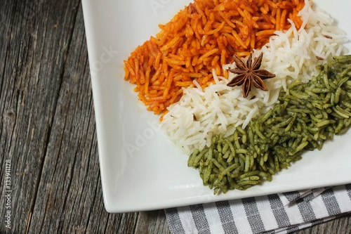 Rice Pulao in Indian flag color / Indian republic day food , selective focus photo