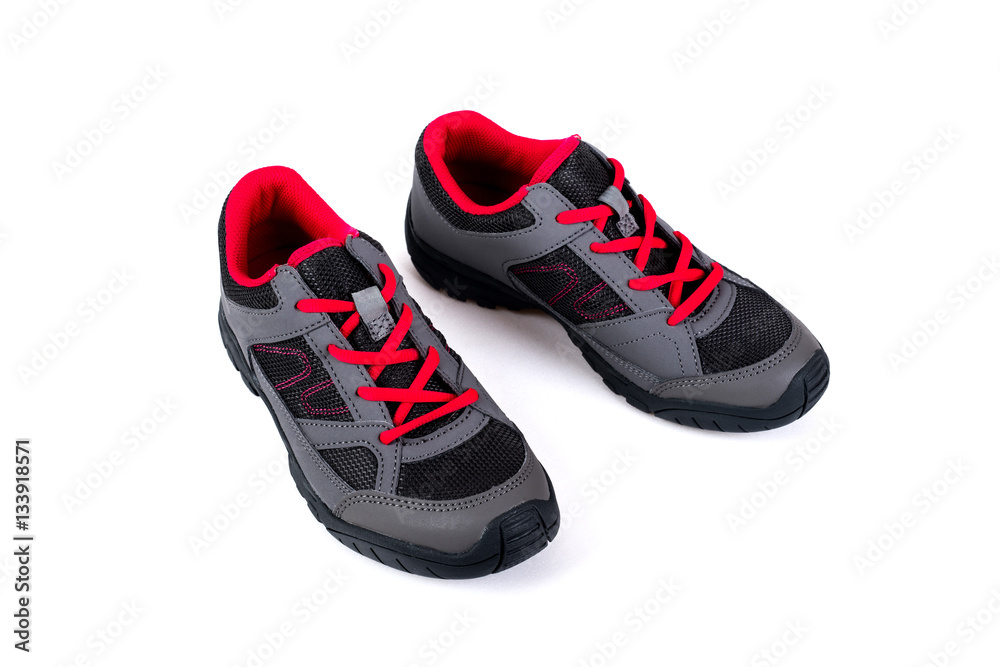 gray and pink children's sneakers on a white background gray and pink children's sneakers on a white background