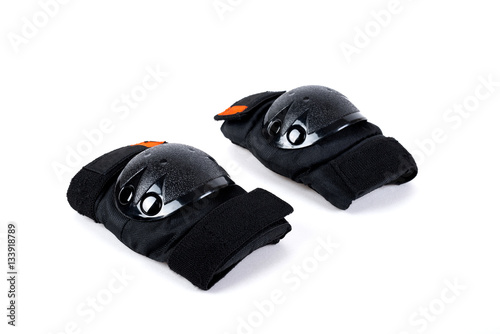 Protectors for knees and elbows on white background
