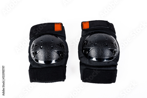 Protectors for knees and elbows on white background photo