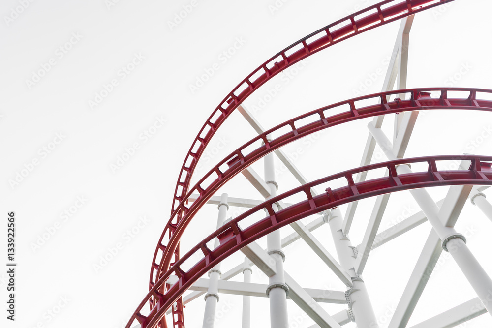 Roller coaster (red) in the amusement park isolated (copy space)