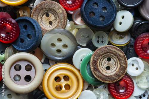 Assorted colored buttons close up photo