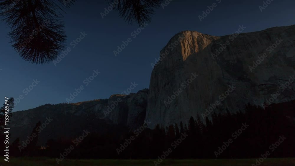 Dawn Wall Sunrise - The sun rises on El Capitan's dawn wall in Yosemite Valley.