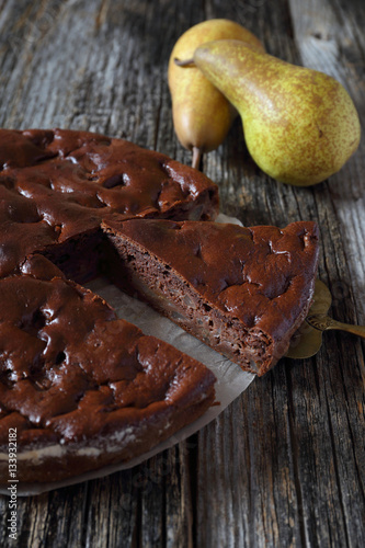 Slika na platnu Chocolate pear cake and two pears