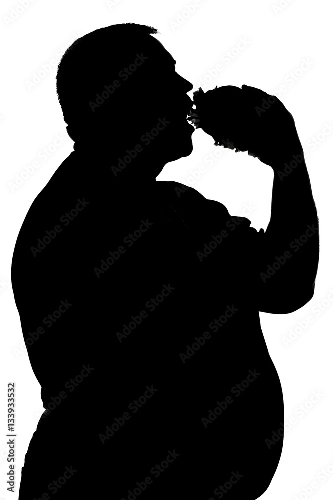 silhouette of a man who eats unhealthy food
