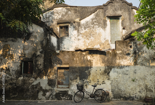 A very all wall looking like painting in Hoi An ancient town, UNESCO world heritage. Hoi An is one of the most popular destinations in Vietnam