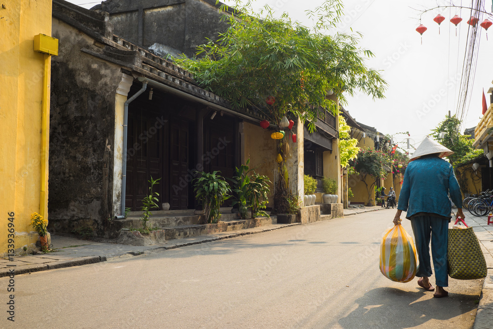 custom made wallpaper toronto digitalStreet view with old houses in Hoi An ancient town, UNESCO world heritage. Hoi An is one of the most popular destinations in Vietnam
