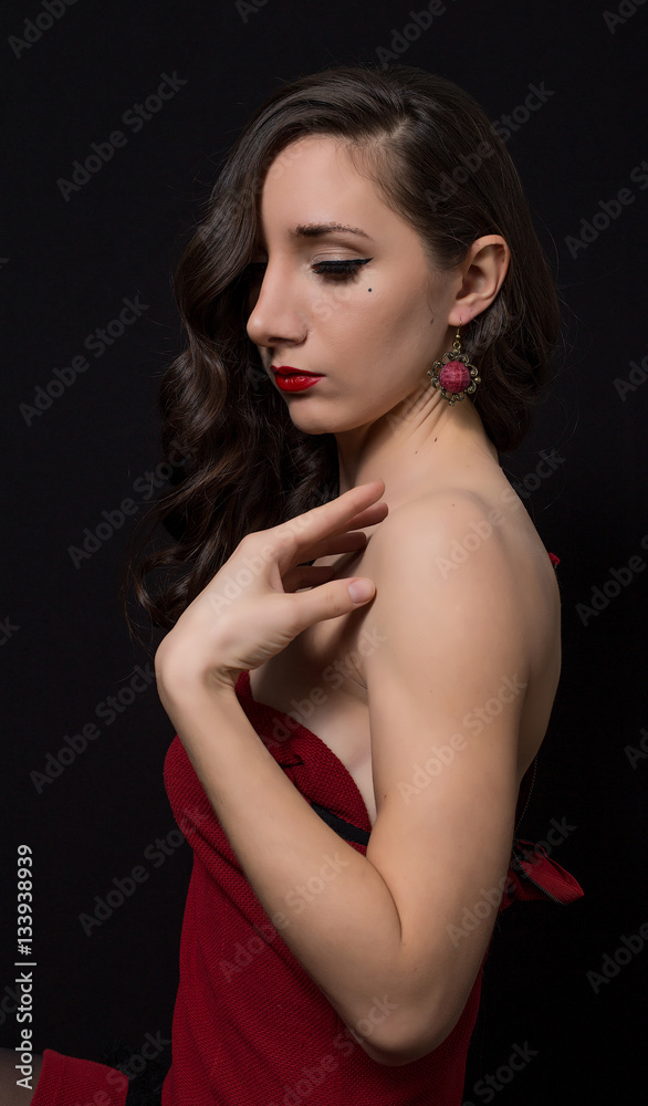 Portrait of beautiful Retro Woman in red dress in Style 1920 - 1930 Portrait of beautiful Retro Woman in red dress in Style 1920 - 1930