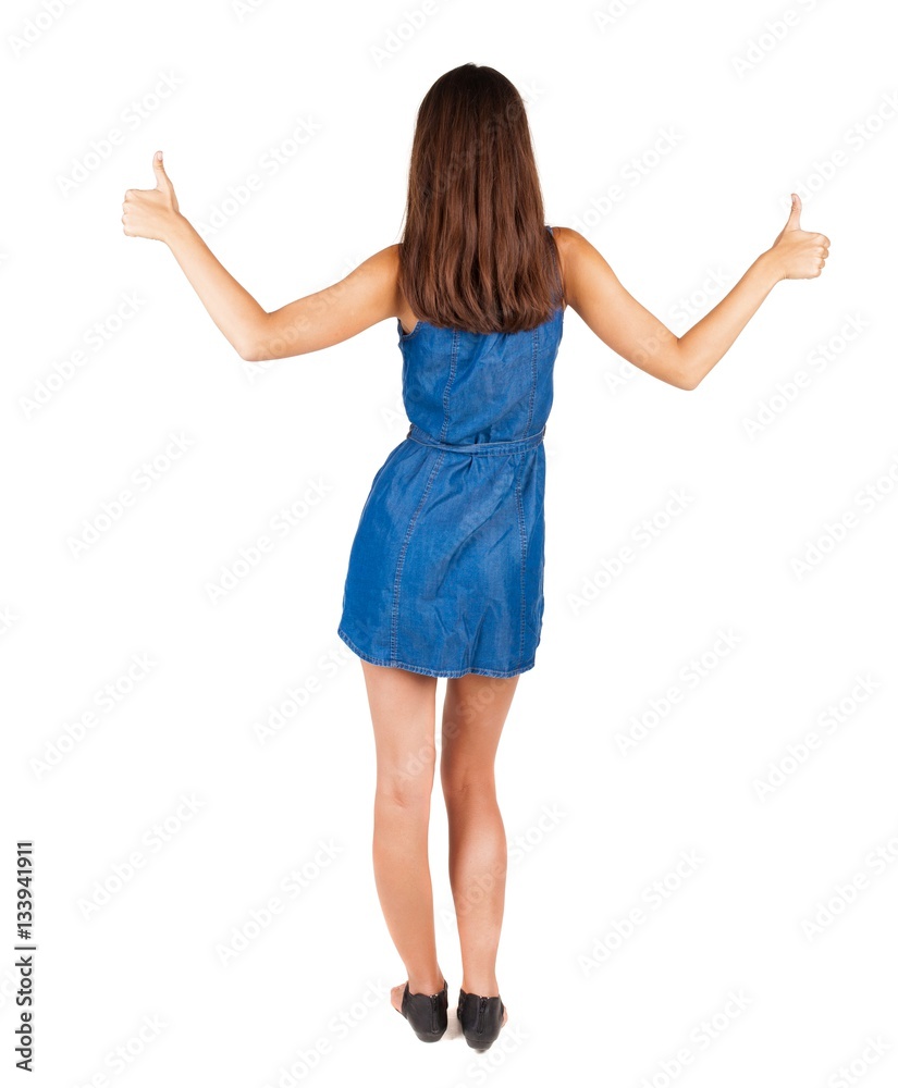 Back view of woman thumbs up two hands. Back view of woman thumbs up two hands.